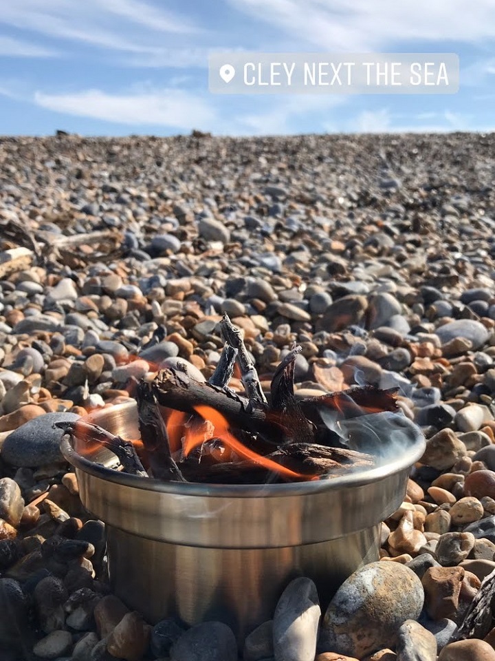 Oh we do like to be beside the seaside! A typical day on the beach in the UK requires a hot drink and fleece jacket. Theres also plenty of driftwood to source to get the kettle going!  Cley-Next-The-Sea (Norfolk, U.K.)