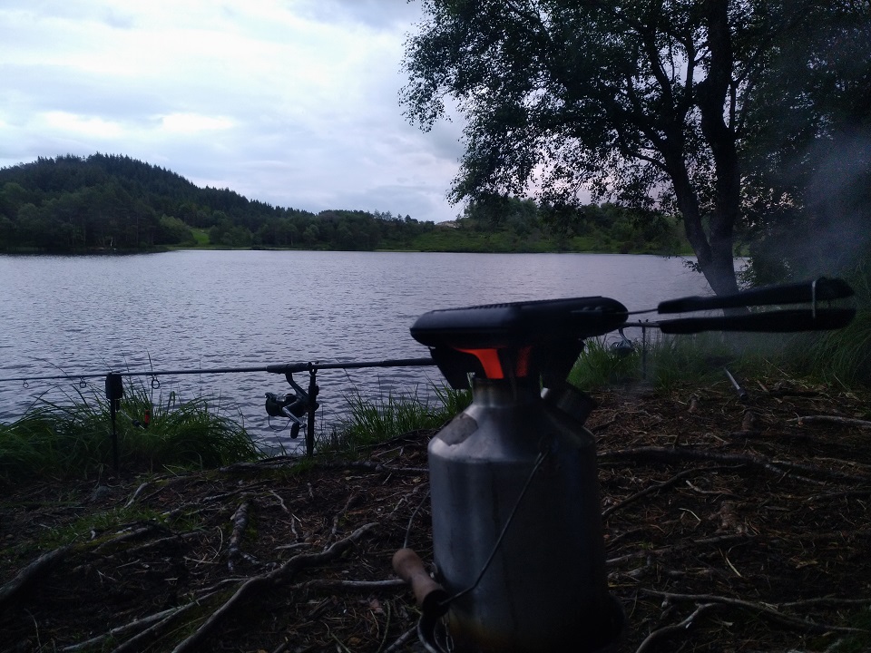 Carp fishing in Norway. Preparing a toast while making a cuppa. (Sveio, Norway)