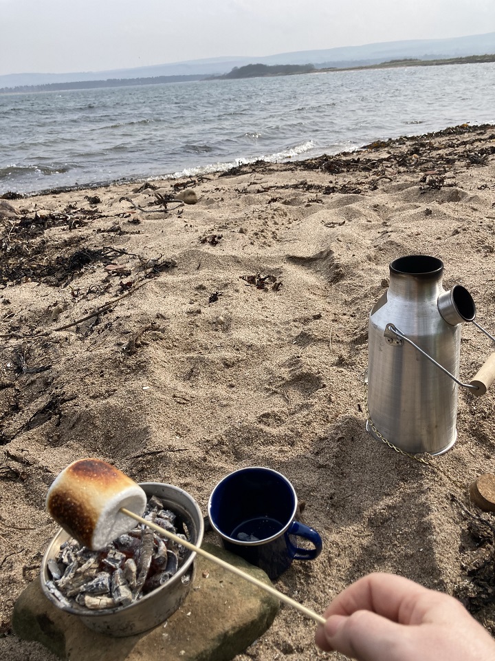 Cuppa tea and Marshmallows keeping me toastie at the beach on a blustery day!