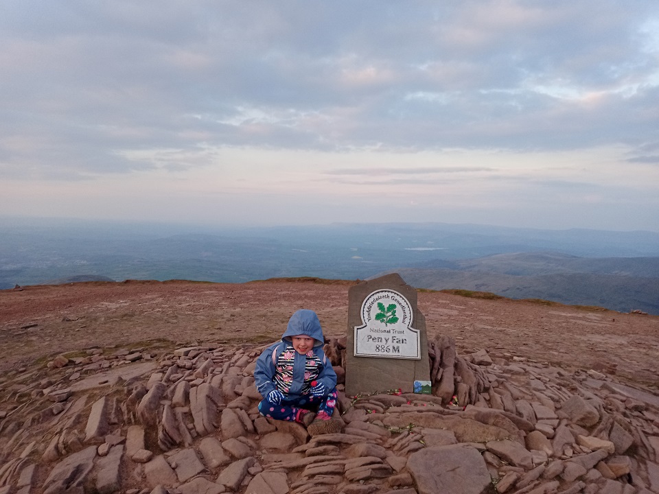 Lyra climbed Pen Y Fan at age 4 (didn't ask to be carried even once). As we reach the bottom she said 'can we go to the park now!'
